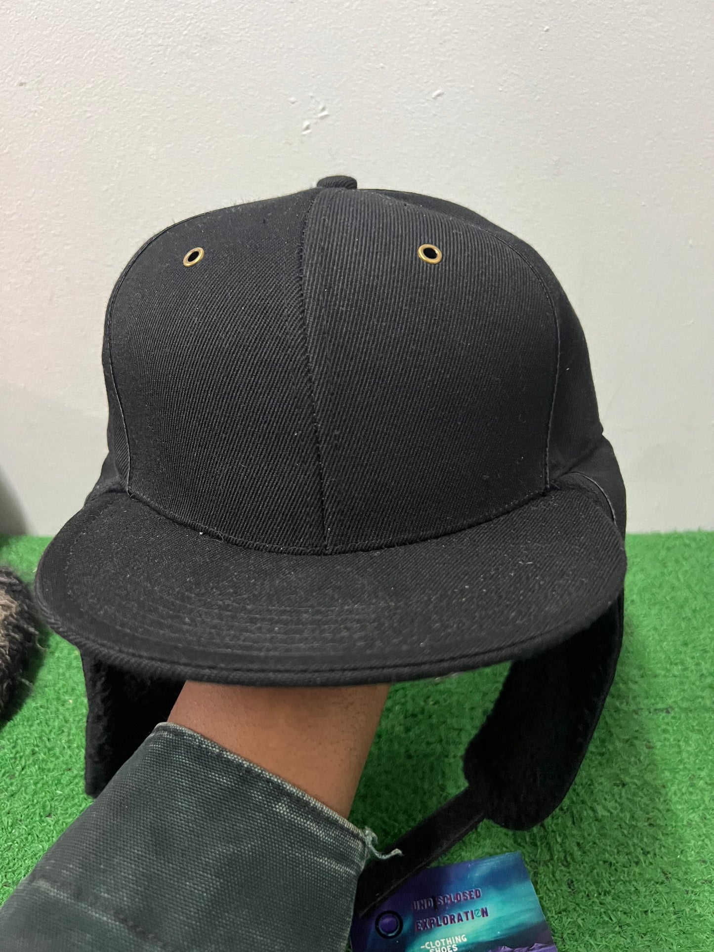 Black ear flap hat