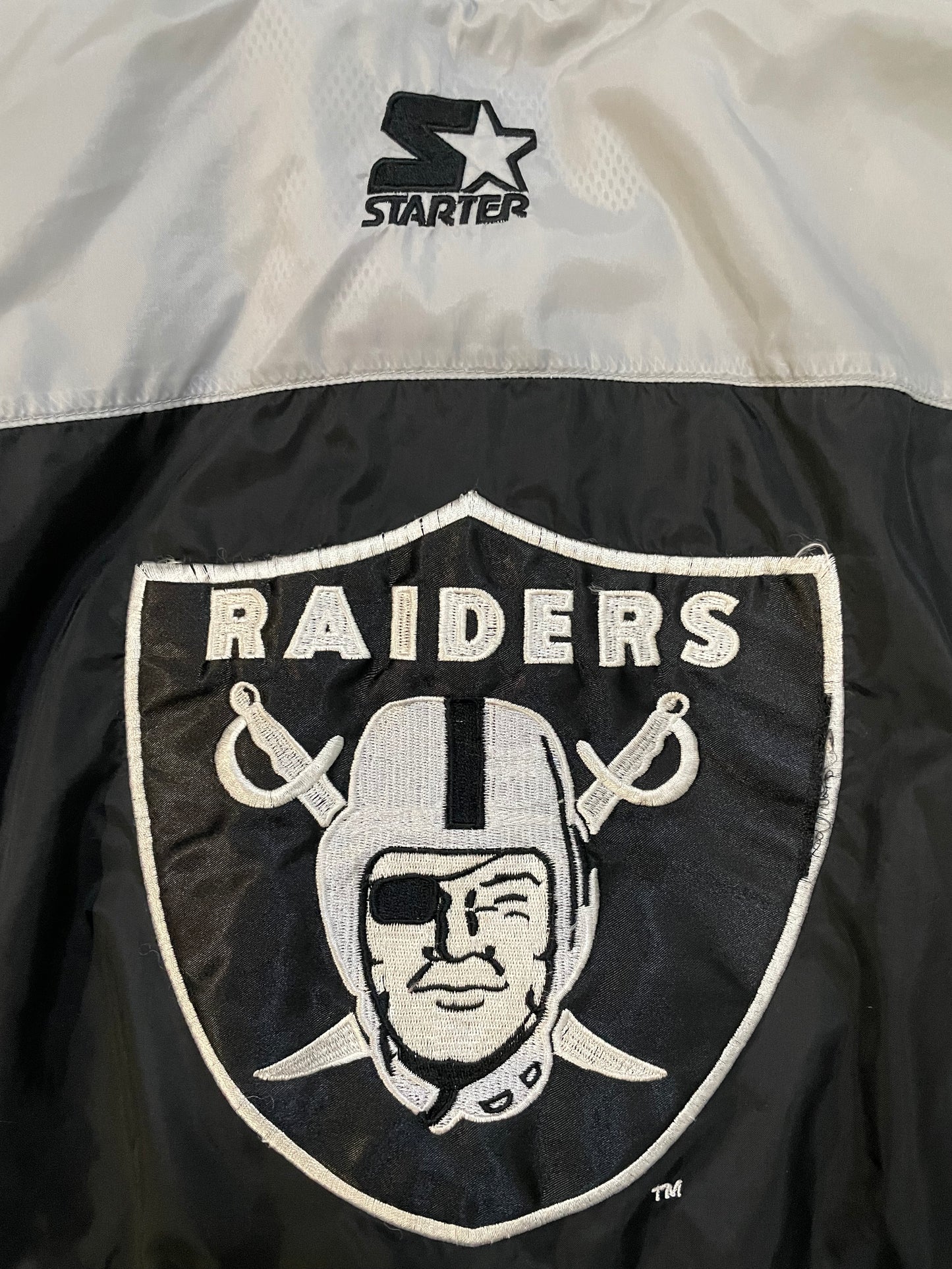 Vintage 1990s Starter Oakland raiders windbreaker jacket