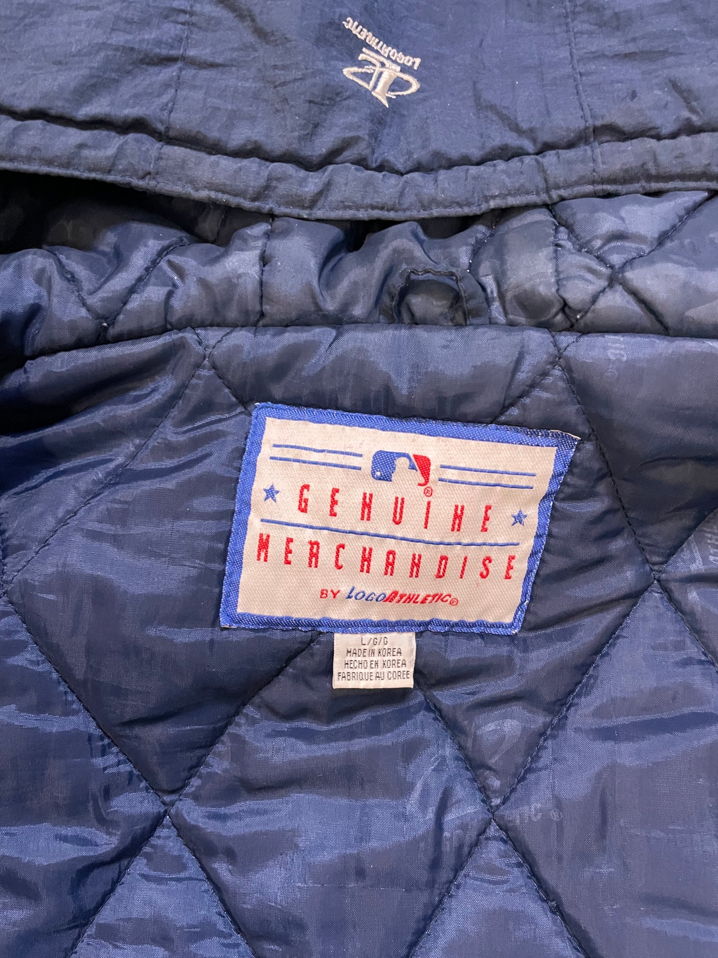 Vintage 1990s Seattle Mariners logo athletic puffer jacket