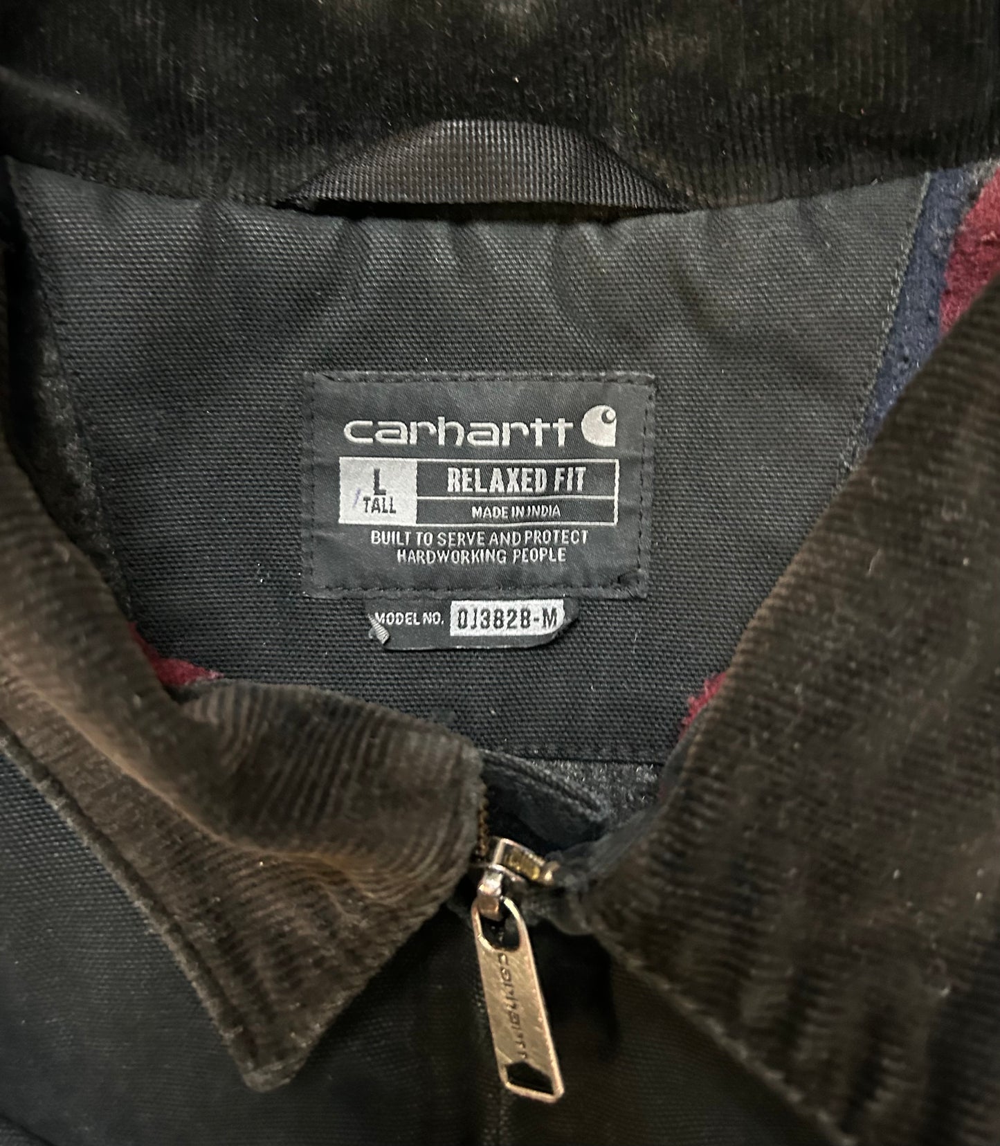 Carhartt distressed black Detroit jacket