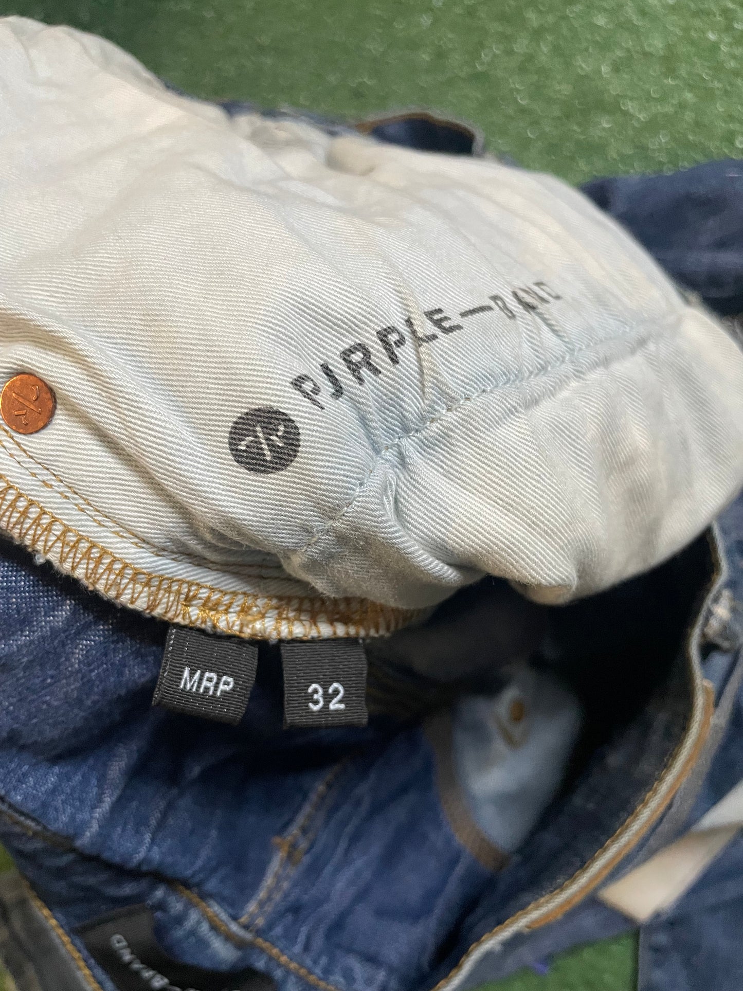 Purple Brand paint splatter jeans