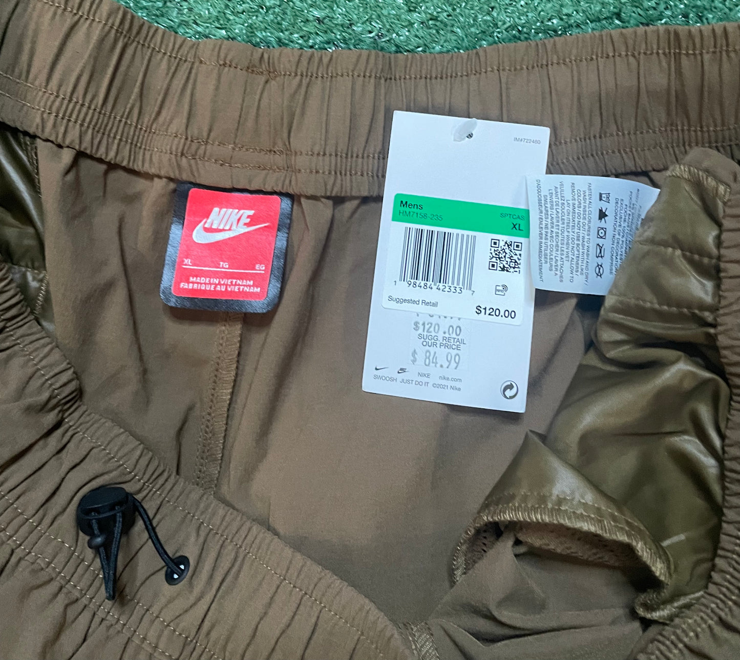 Nike tech woven khaki pants