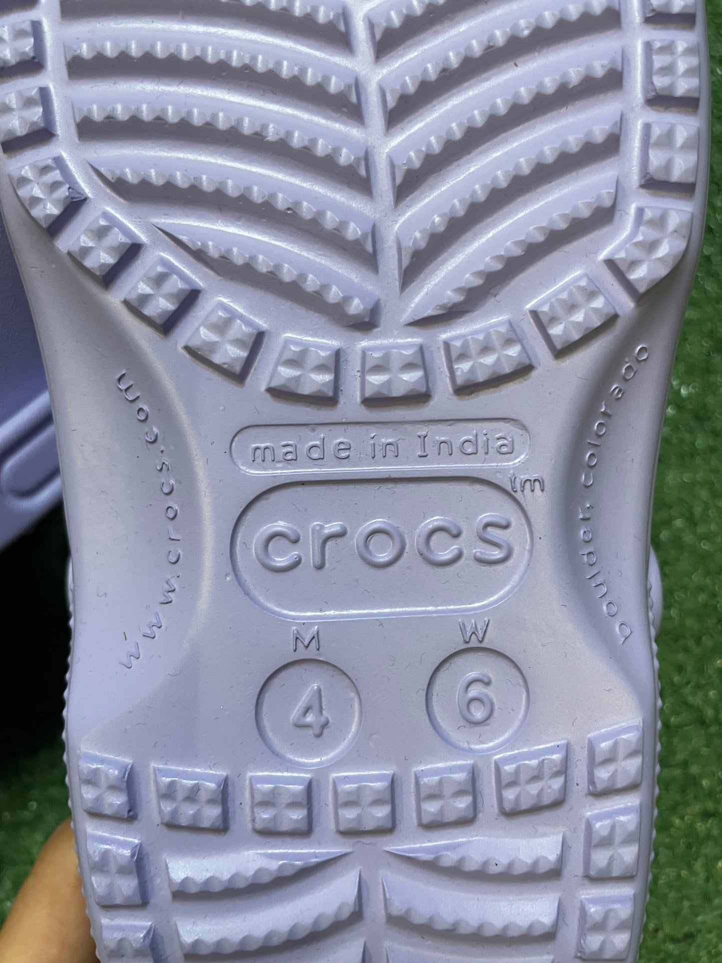 Classic purple Crocs with jibbitz charms