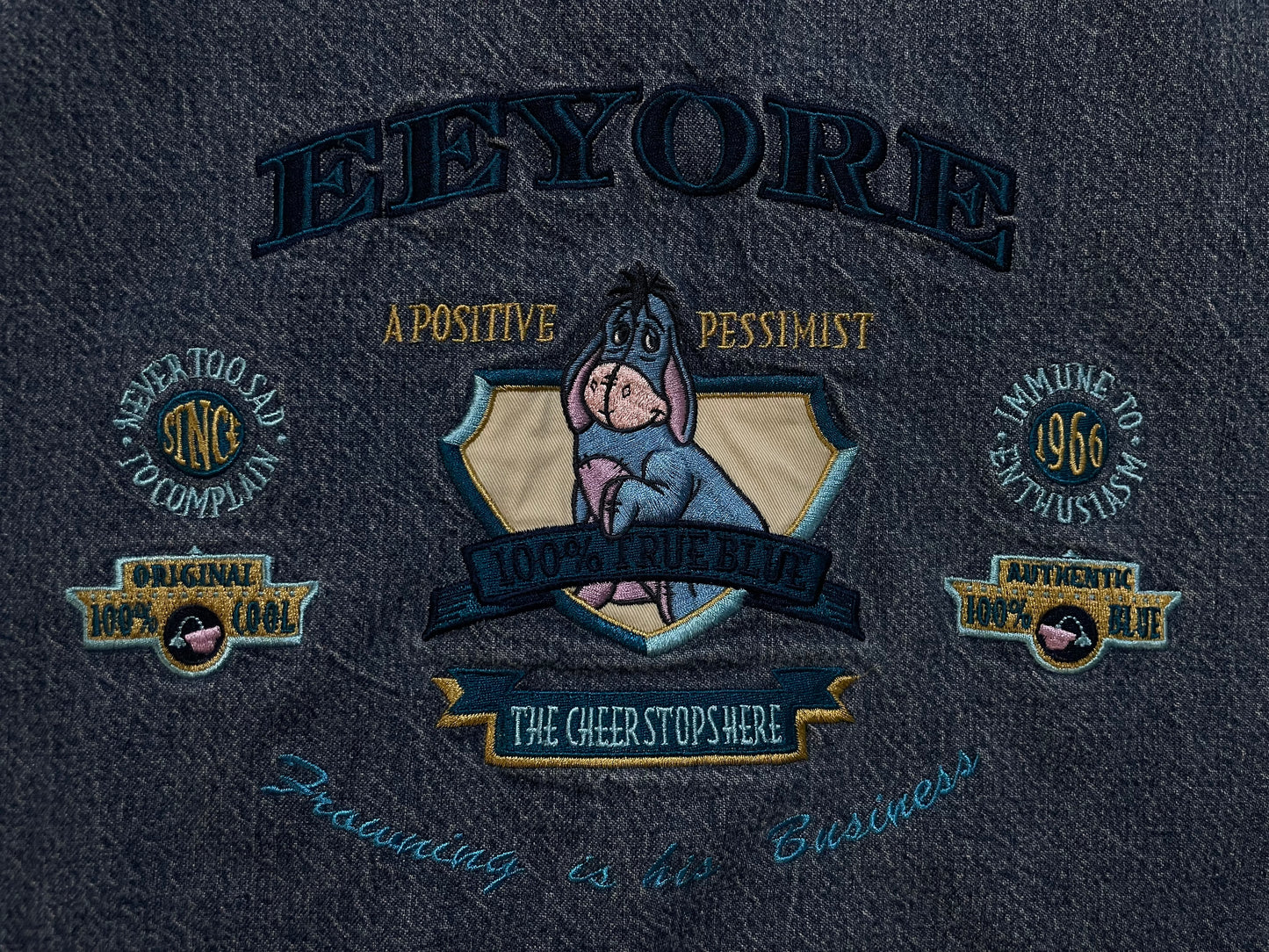 Vintage 1990s Eeyore Disney varsity denim jacket