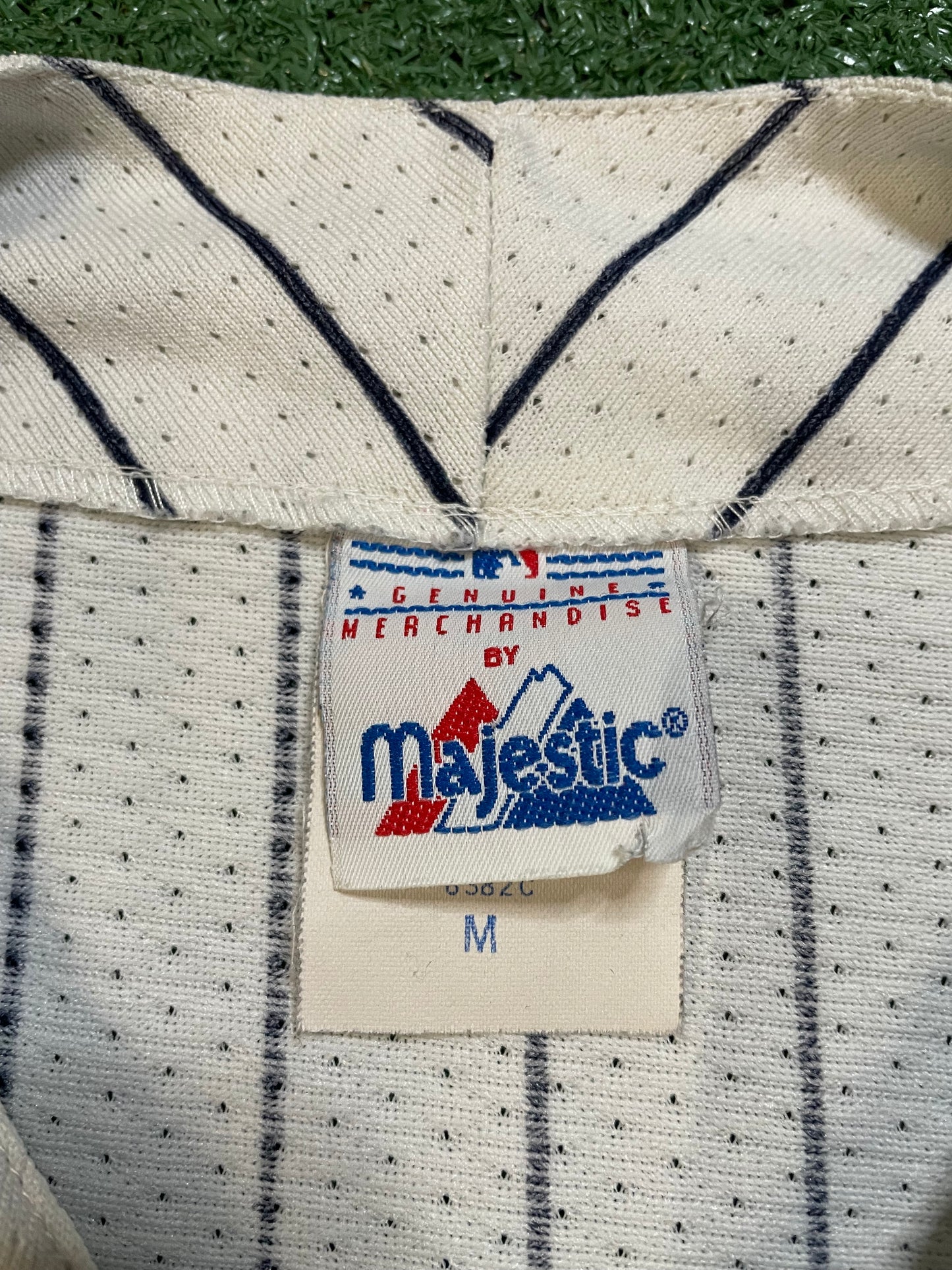 Vintage 1990s Seattle Mariners pinstripe white and teal jersey