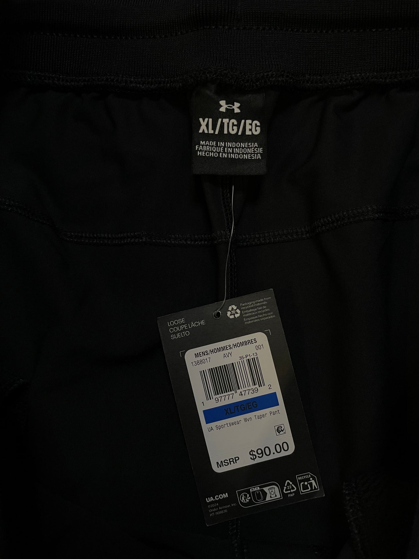 Under Armour woven sportswear taper pants