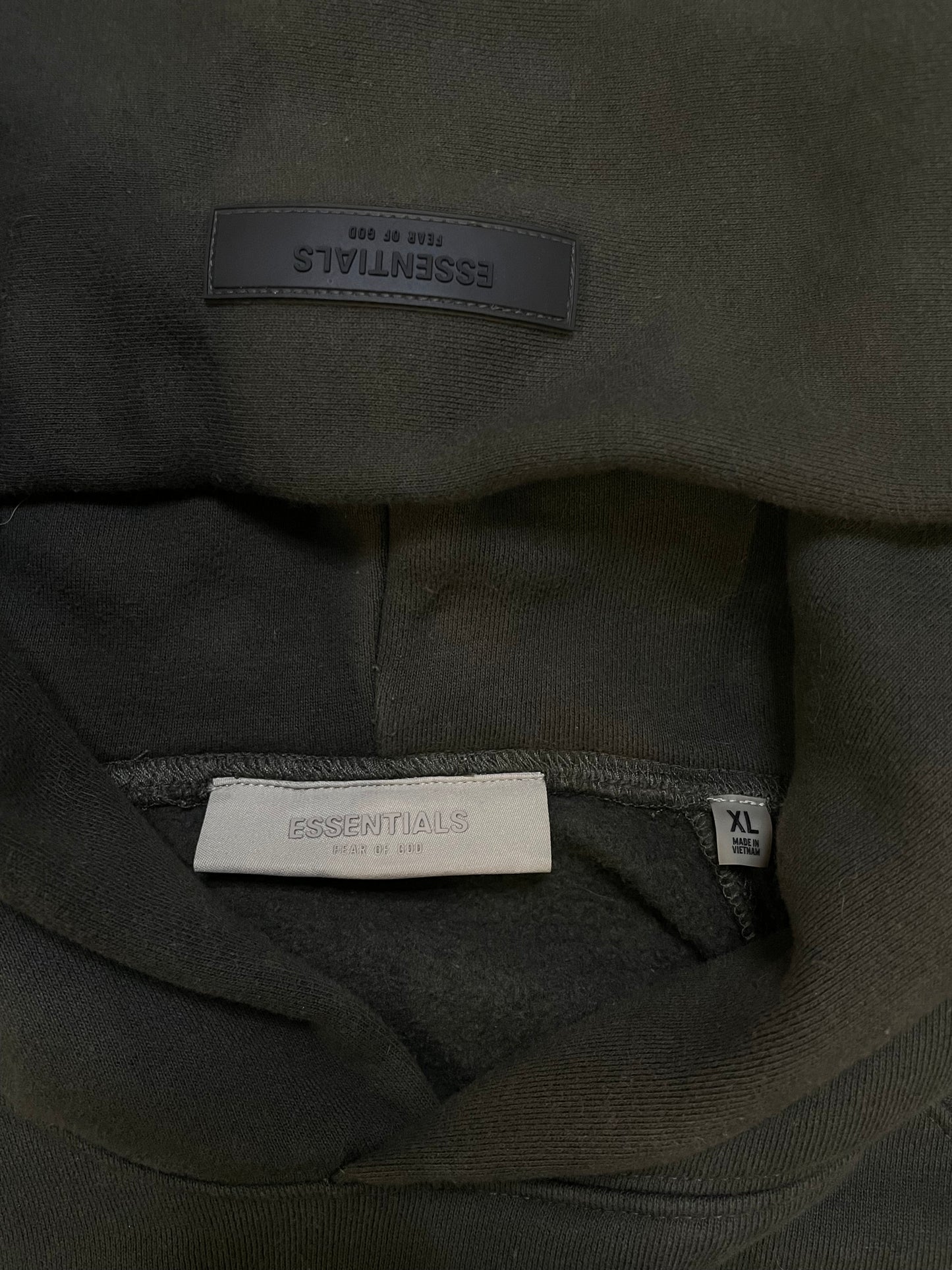 Fear of God Essentials off black hoodie