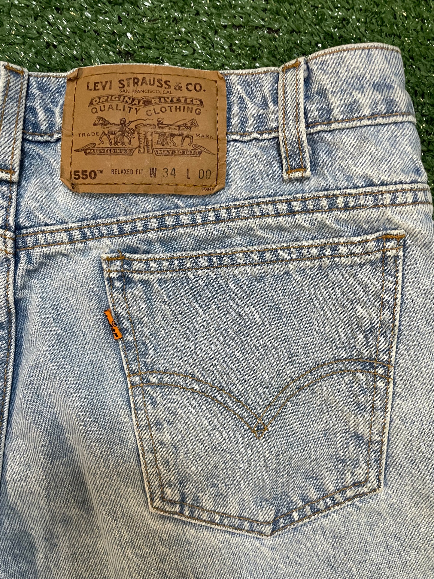 Vintage 1990s Levi jean shorts orange tab