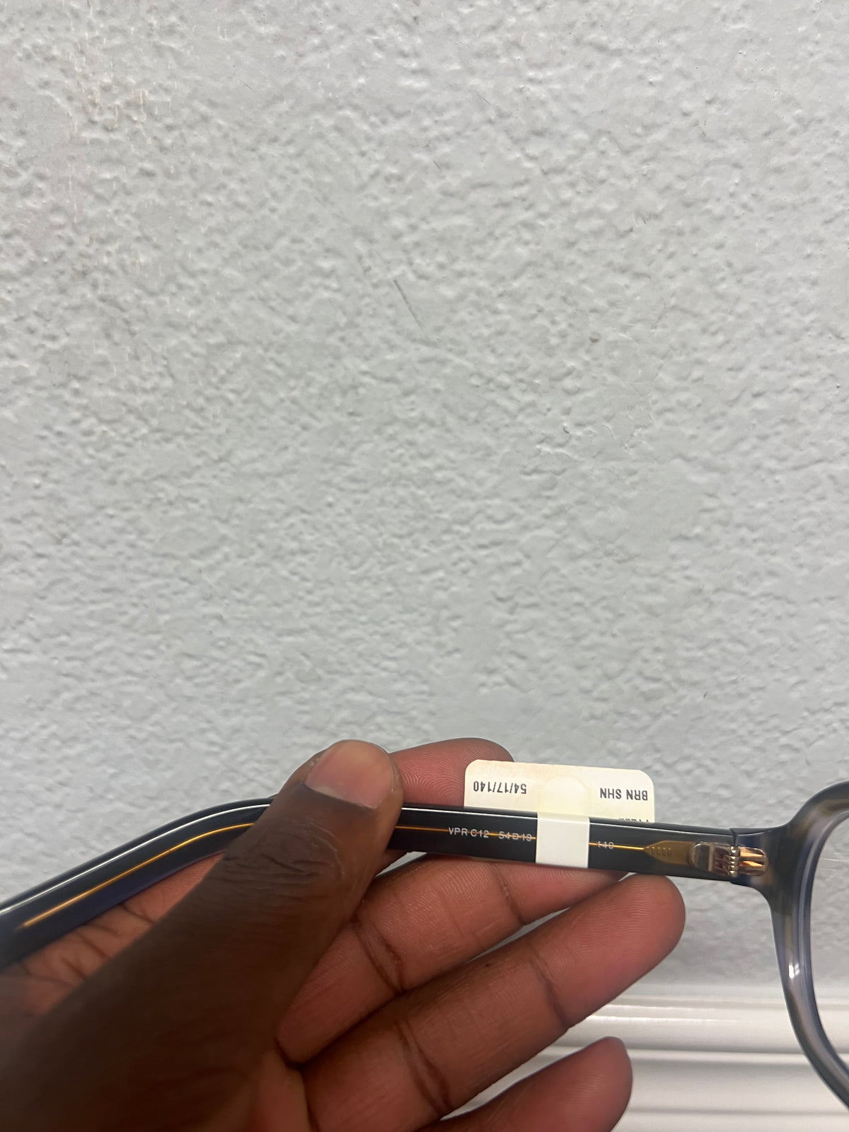 Prada striped lagoon glasses VPR C12