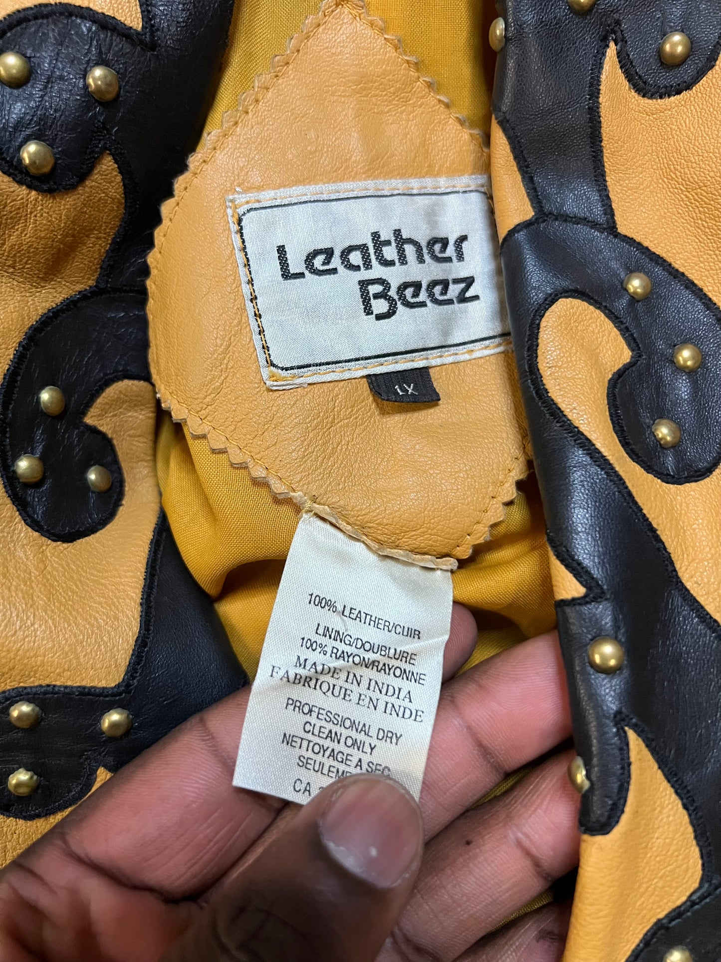 Vintage leather black yellow studded jacket