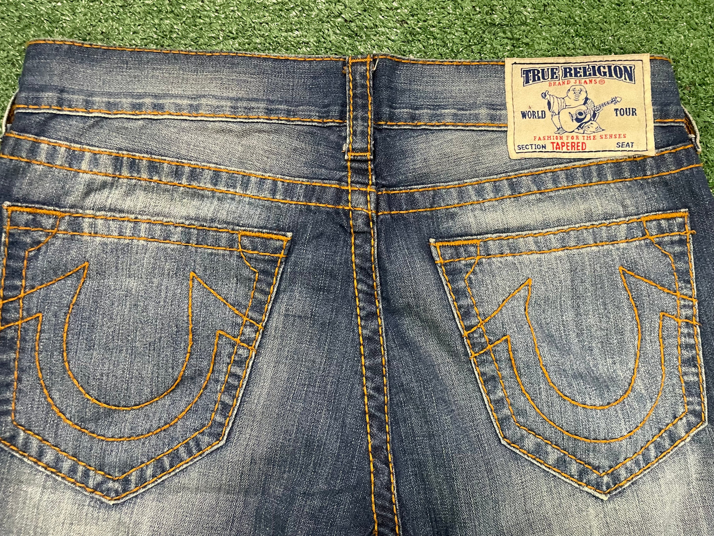 True Religion orange stitch jeans