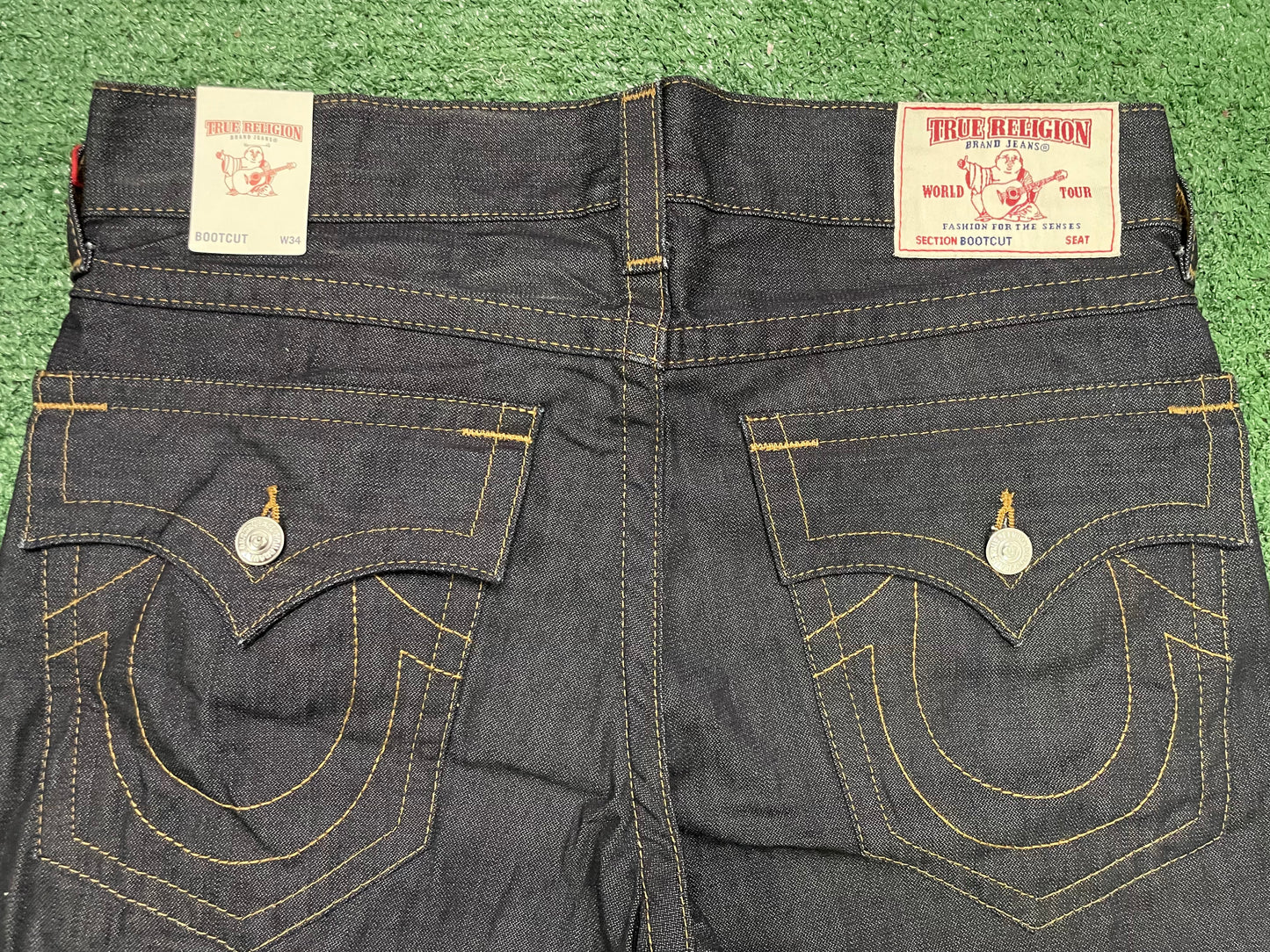 True Religion dark wash gold stitch jeans