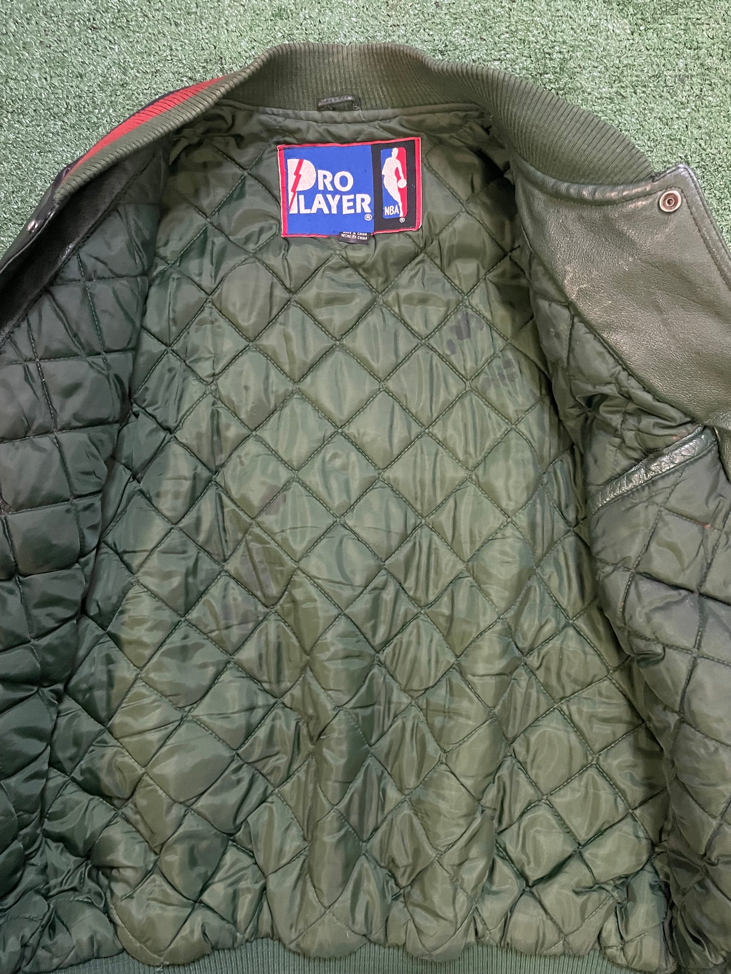 Vintage 1990s Seattle Sonics pro player leather jacket