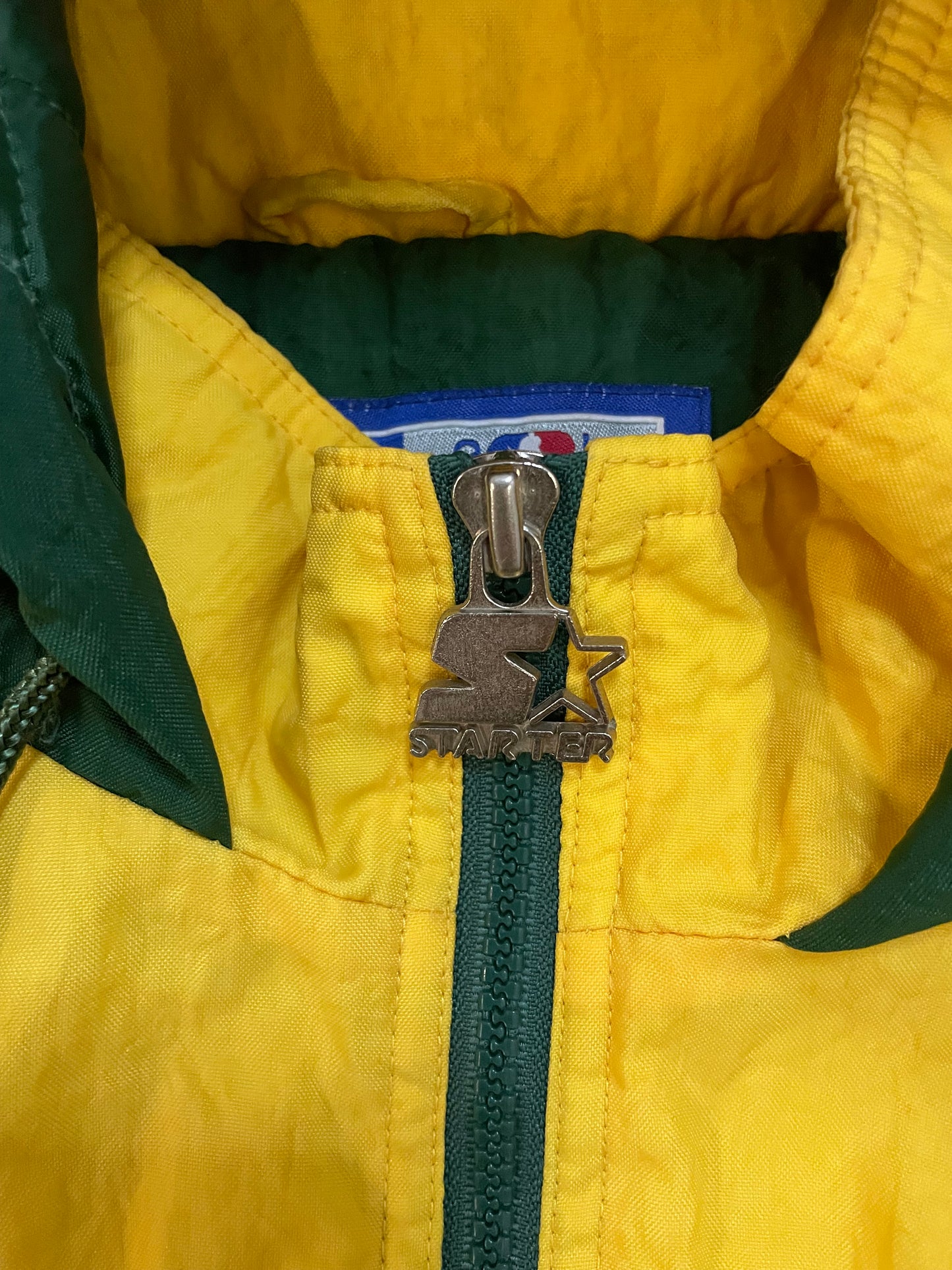 Vintage 1990s Seattle Supersonics starter jacket