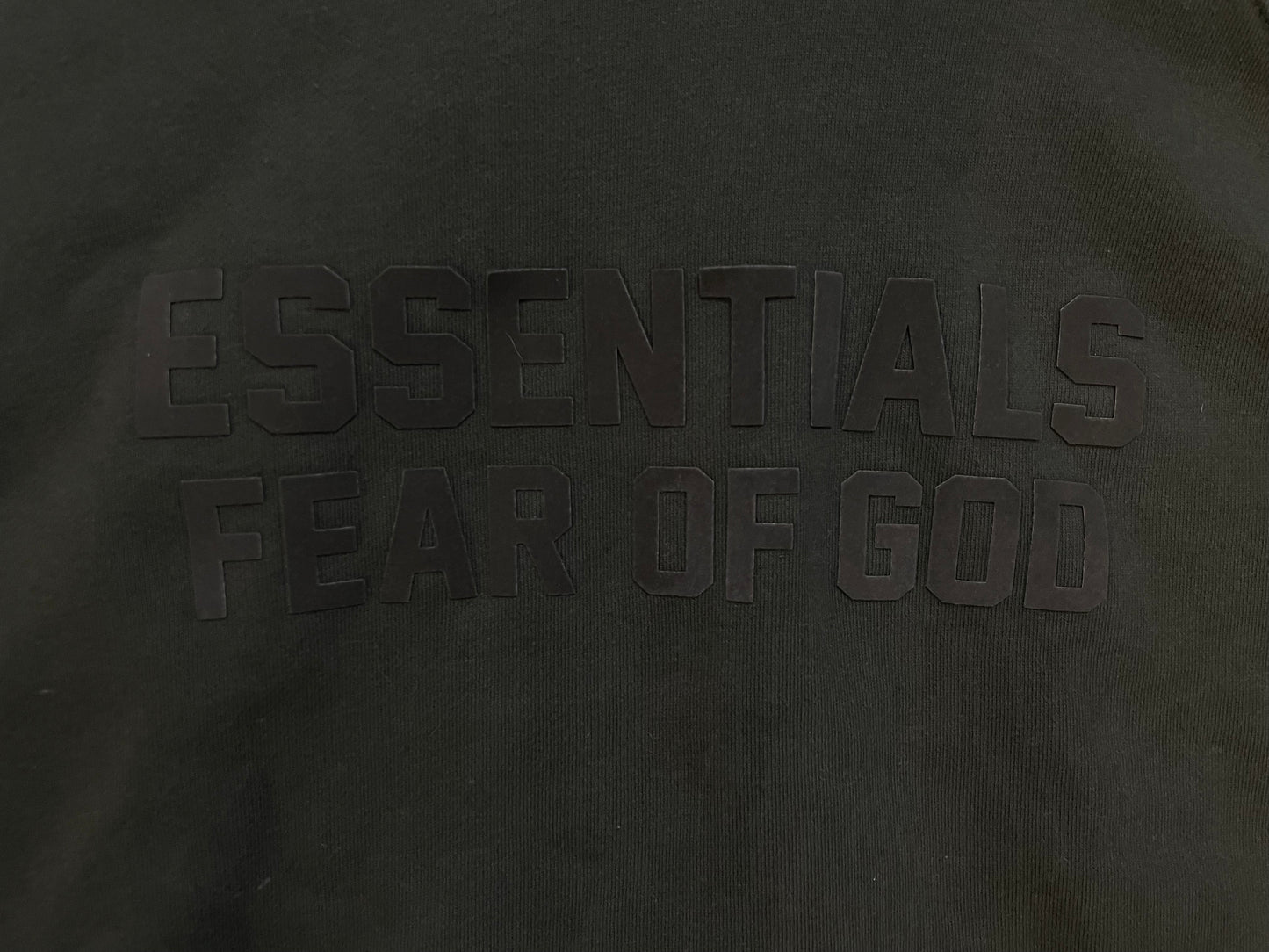 Fear of God Essentials off black hoodie