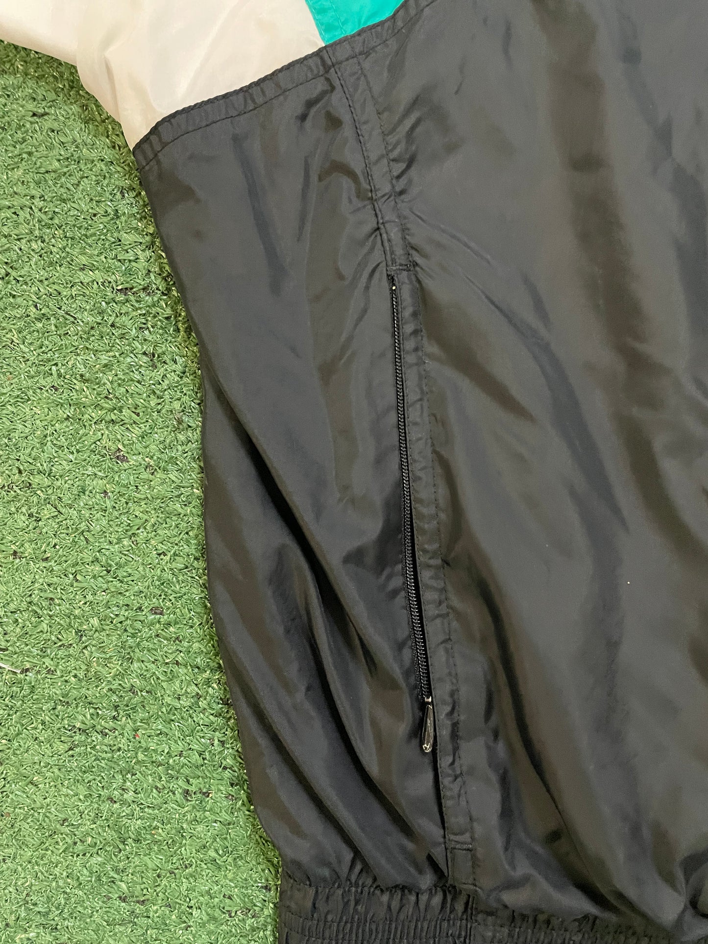 Vintage 1990s Nike black and teal windbreaker