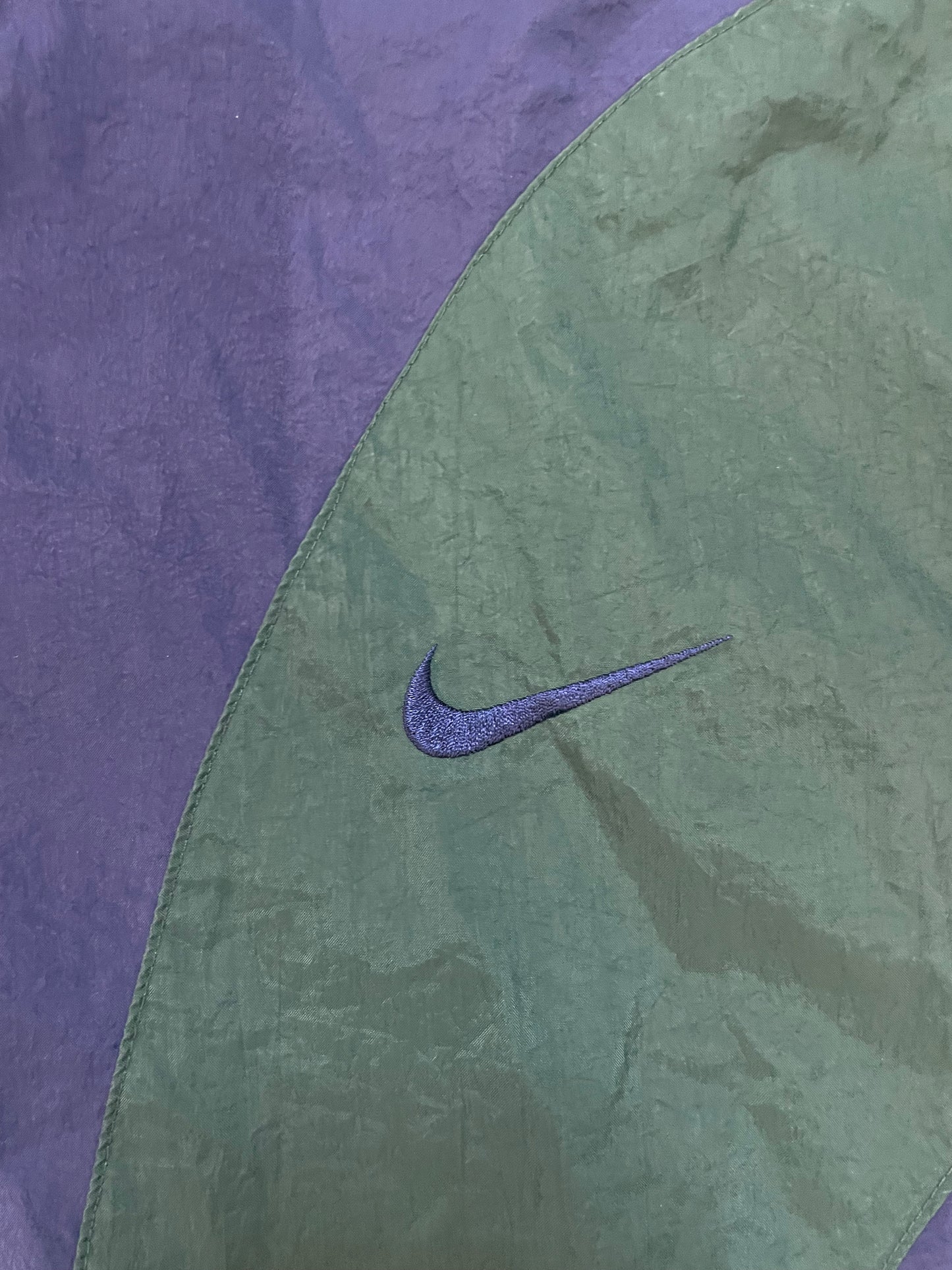 Vintage 1990s Nike blue green and white windbreaker jacket