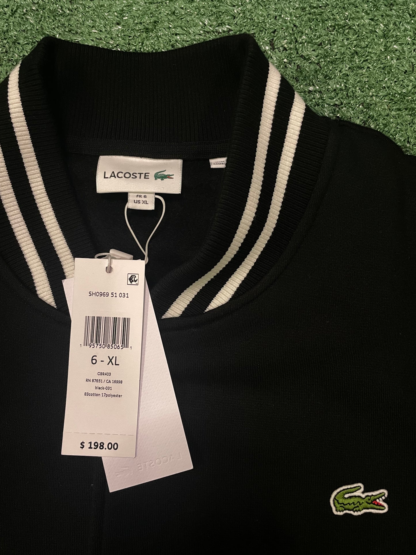 Lacoste black and white varsity jacket