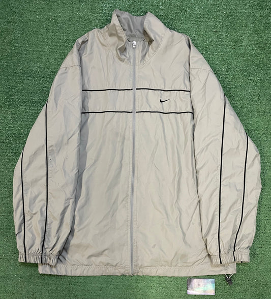 Vintage 2000s Nike silver windbreaker jacket
