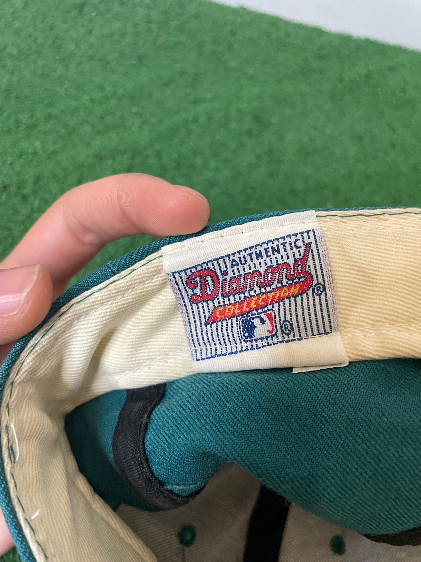 Vintage 1990s Seattle Mariners teal fitted hat