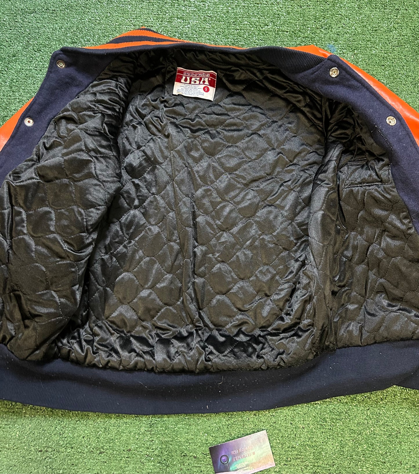 Vintage 1990s navy and orange varsity jacket