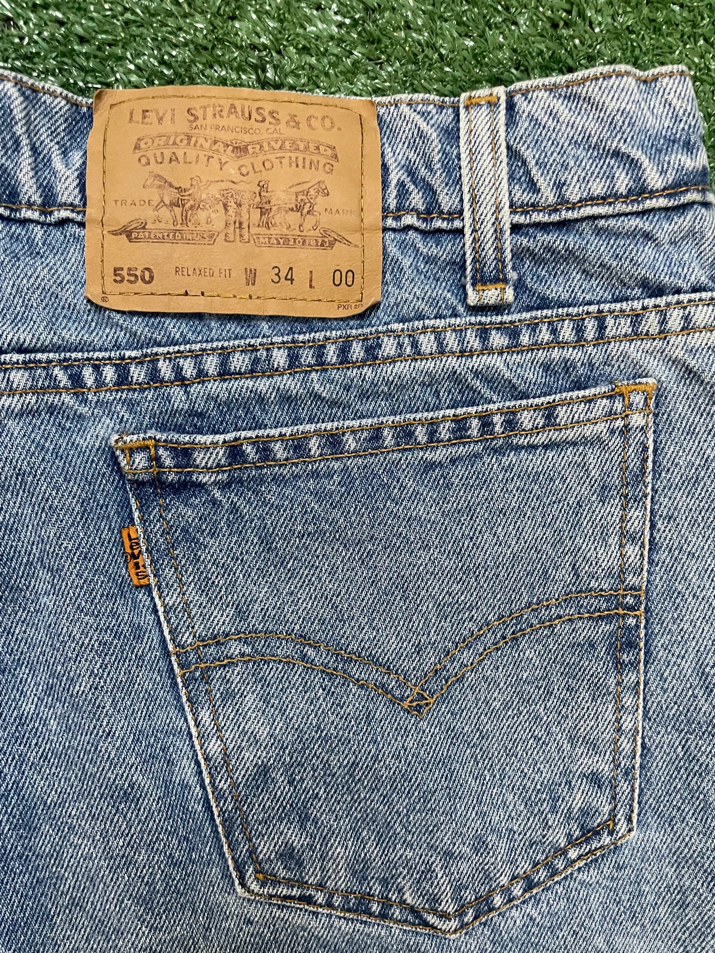 Vintage 1990s Levi 550 orange tab Jean shorts