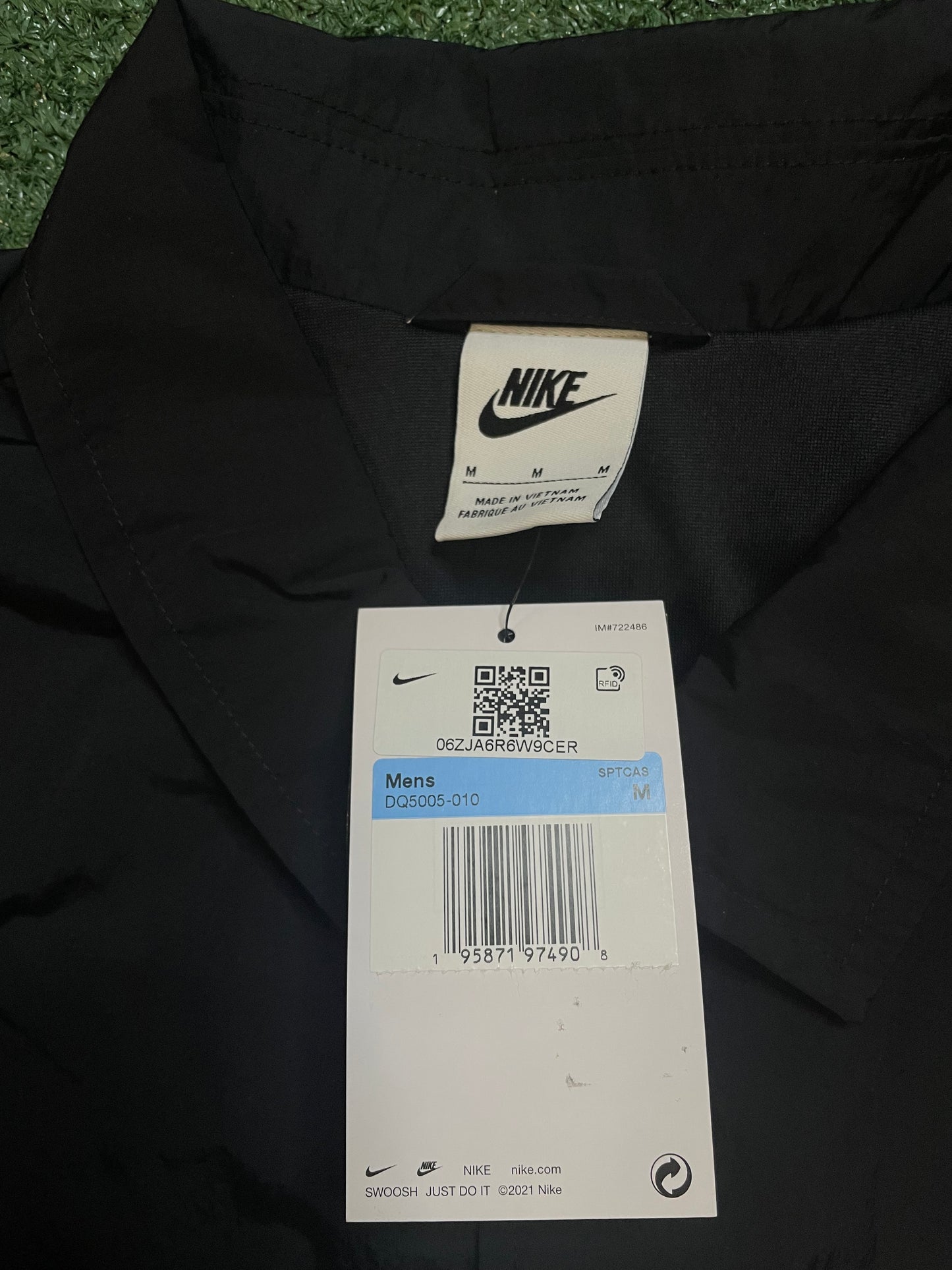 Nike black coach jacket