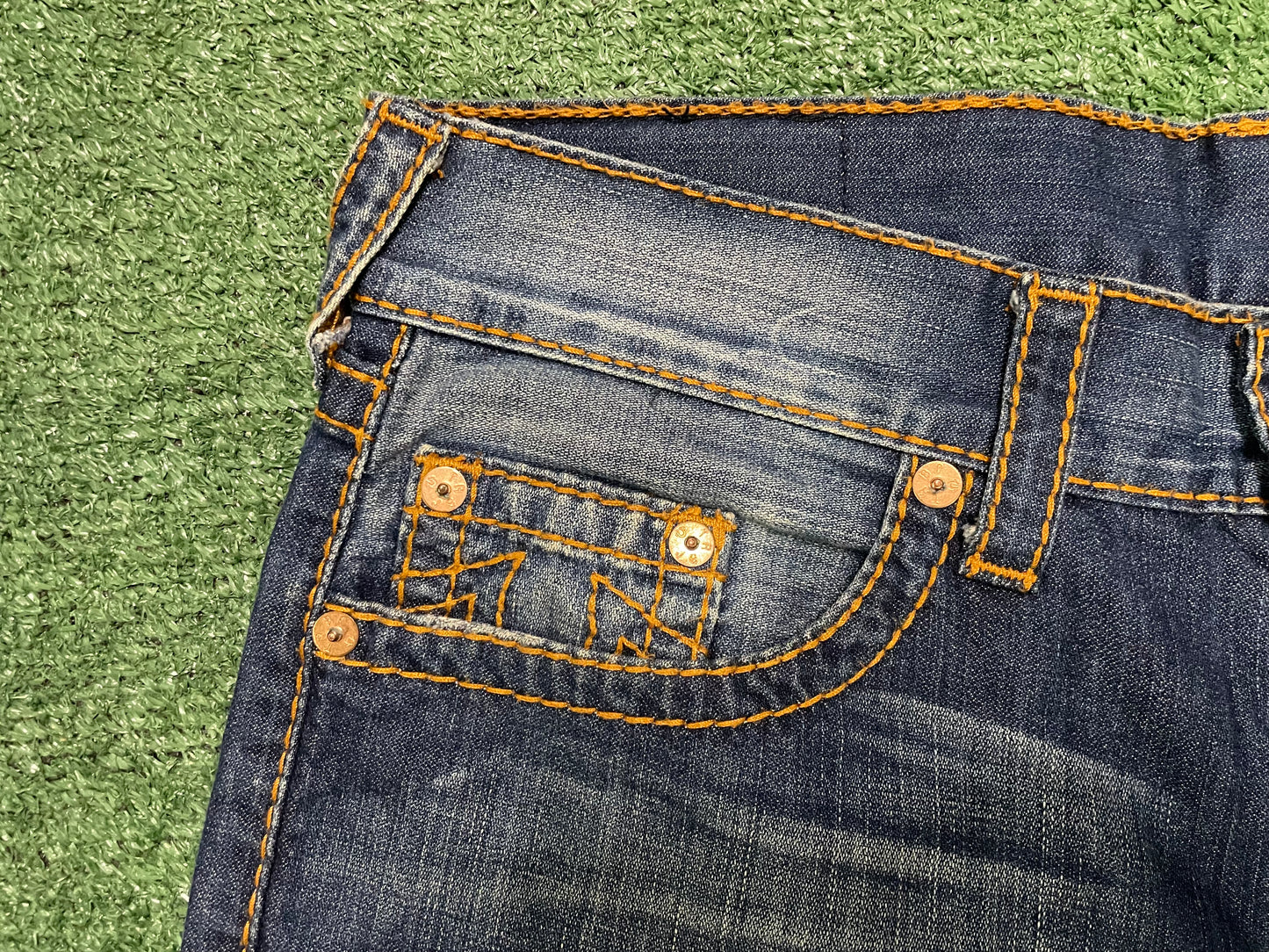 True Religion orange stitch jeans