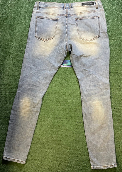 Embellish light wash distressed jeans