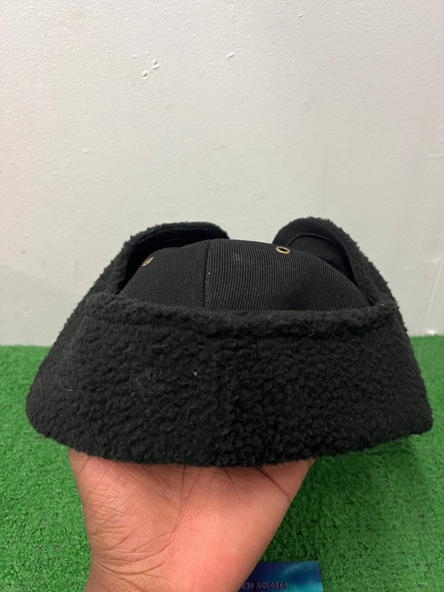 Black ear flap hat