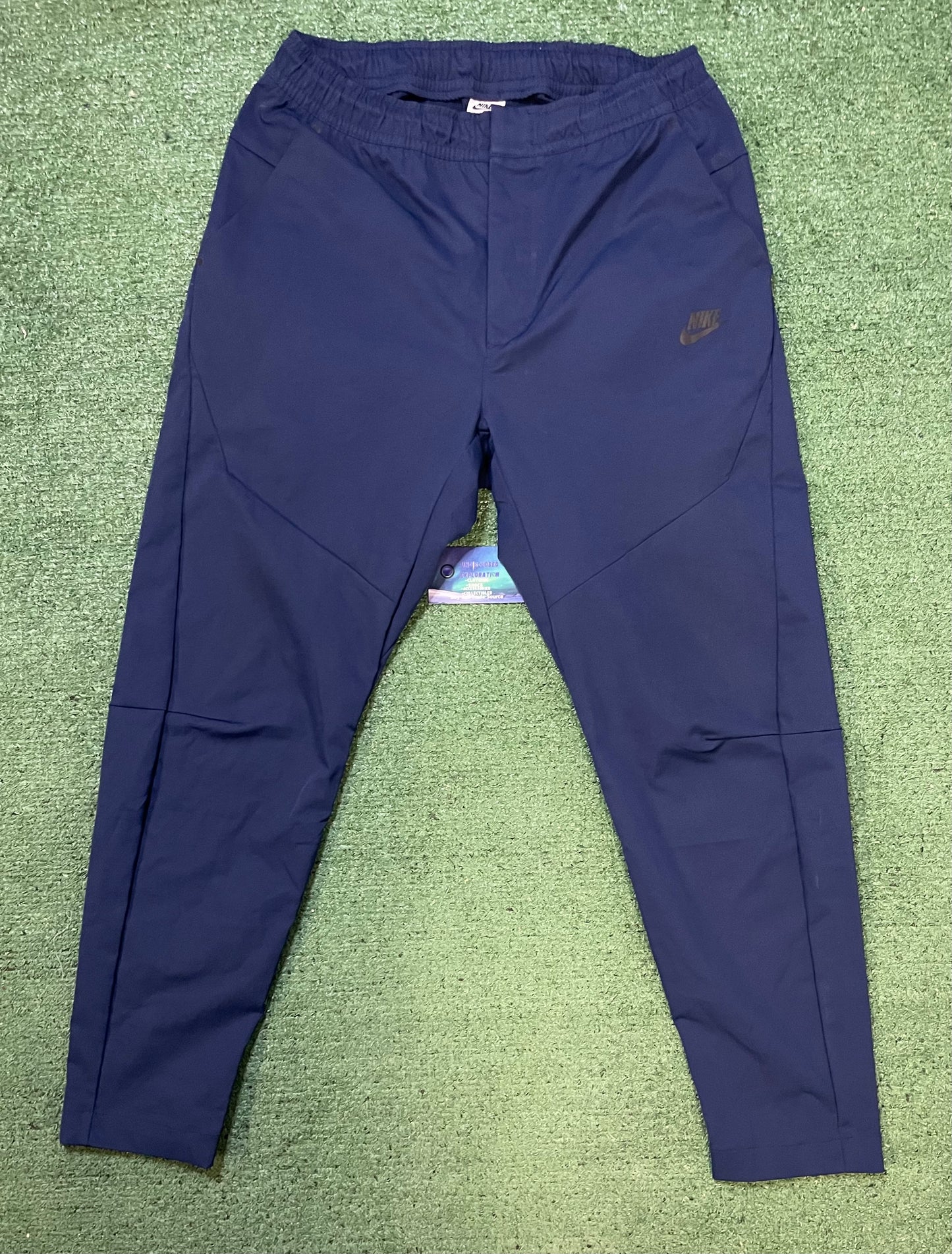 Nike woven navy tech pants