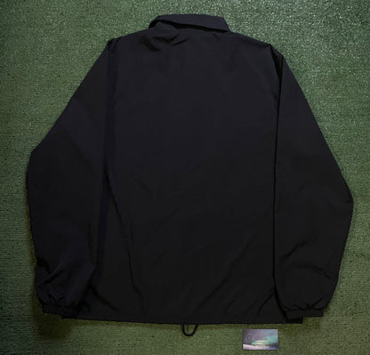 Nike black coach jacket
