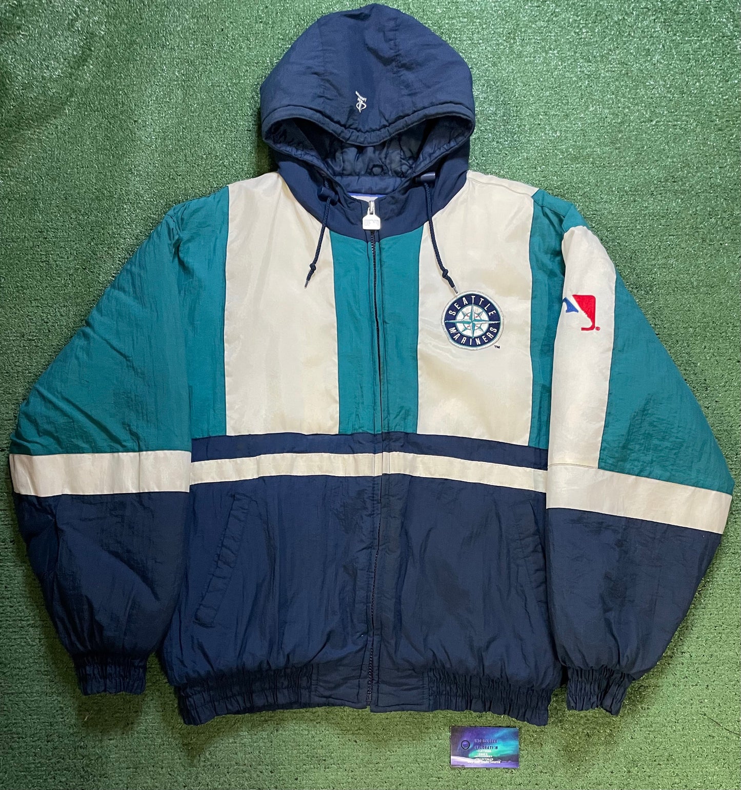 Vintage 1990s Seattle Mariners logo athletic puffer jacket