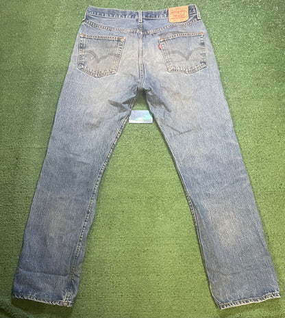 Vintage Levi 501 light wash faded jeans