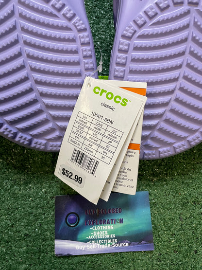 Classic purple Crocs with jibbitz charms