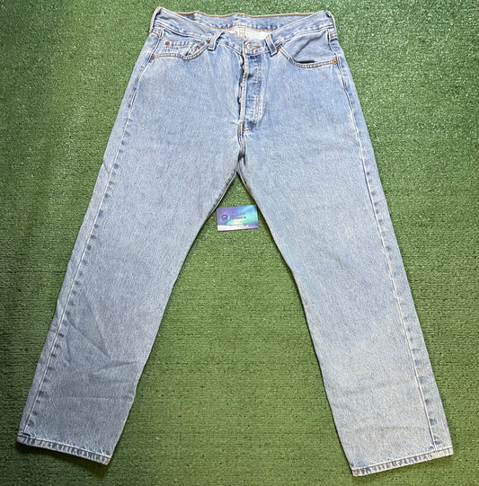 Vintage 1990s Levi 501 light wash jeans