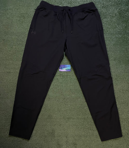Under Armour woven sportswear taper pants