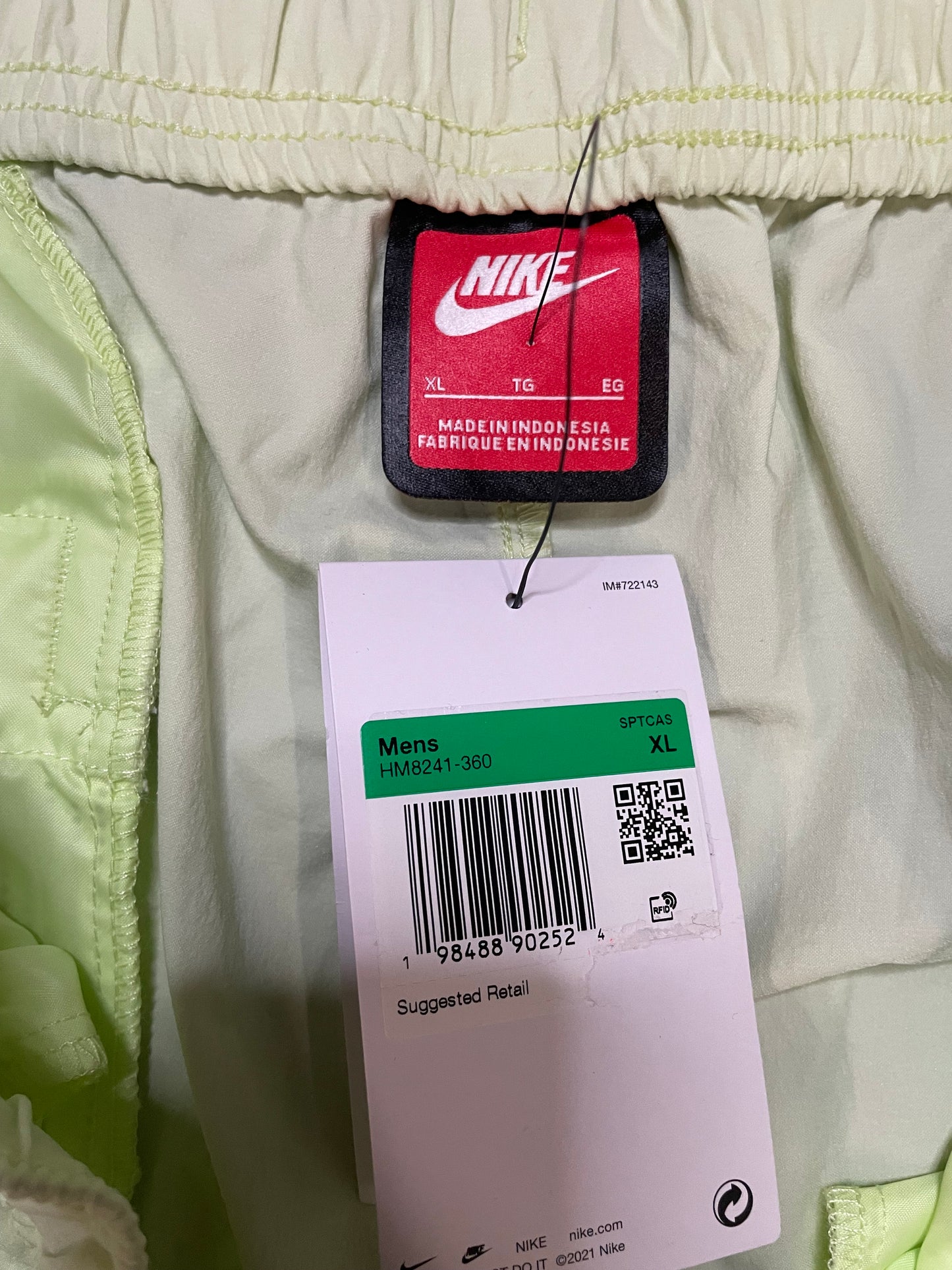 Nike tech woven lime pants