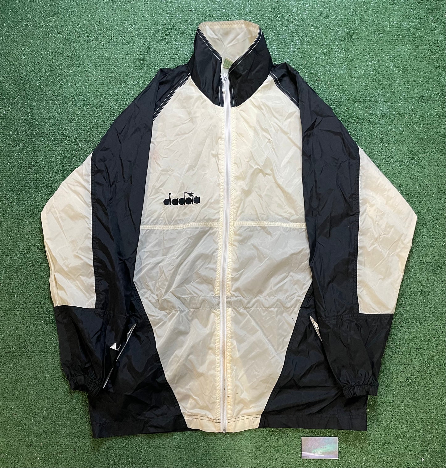 Vintage 1990s Diadora black and white windbreaker jacket