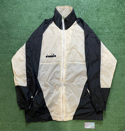 Vintage 1990s Diadora black and white windbreaker jacket