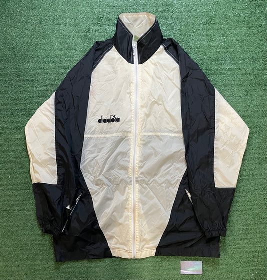 Vintage 1990s Diadora black and white windbreaker jacket