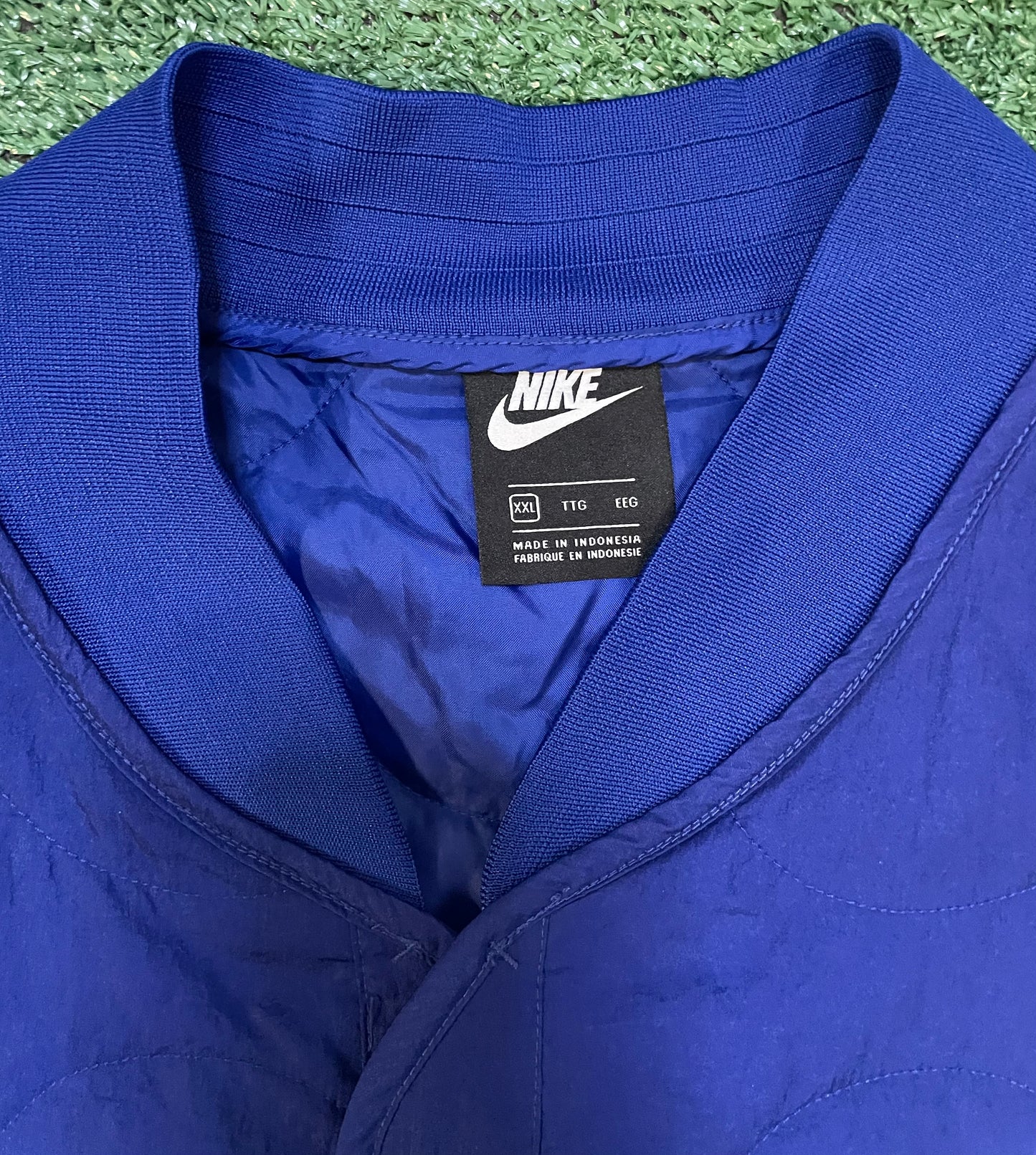 Nike swoosh quilted blue jacket