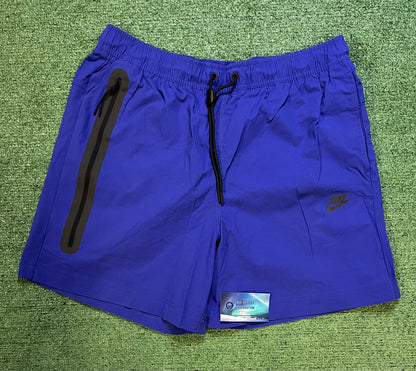 Nike tech woven purple shorts
