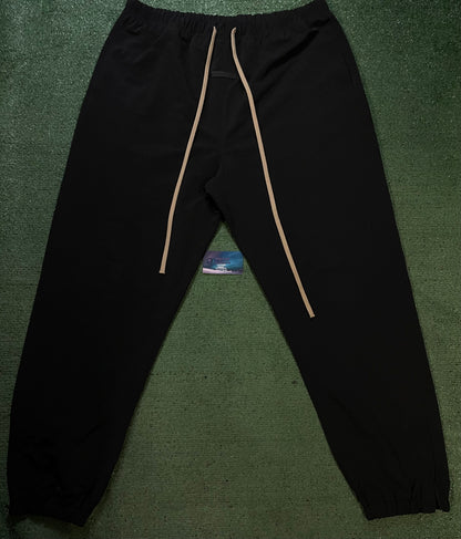 Fear of God Essentials black nylon track pants