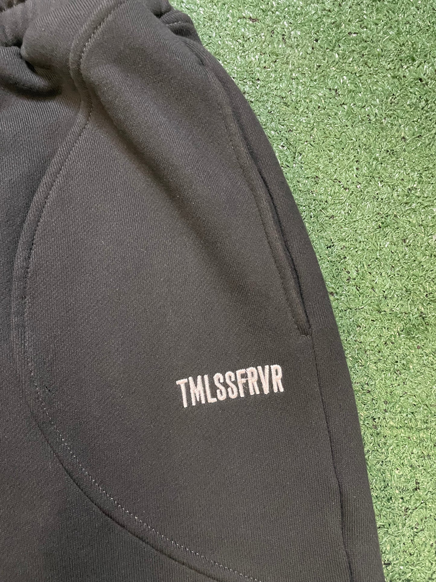 TMLSSFRVR black swirly sweatpants