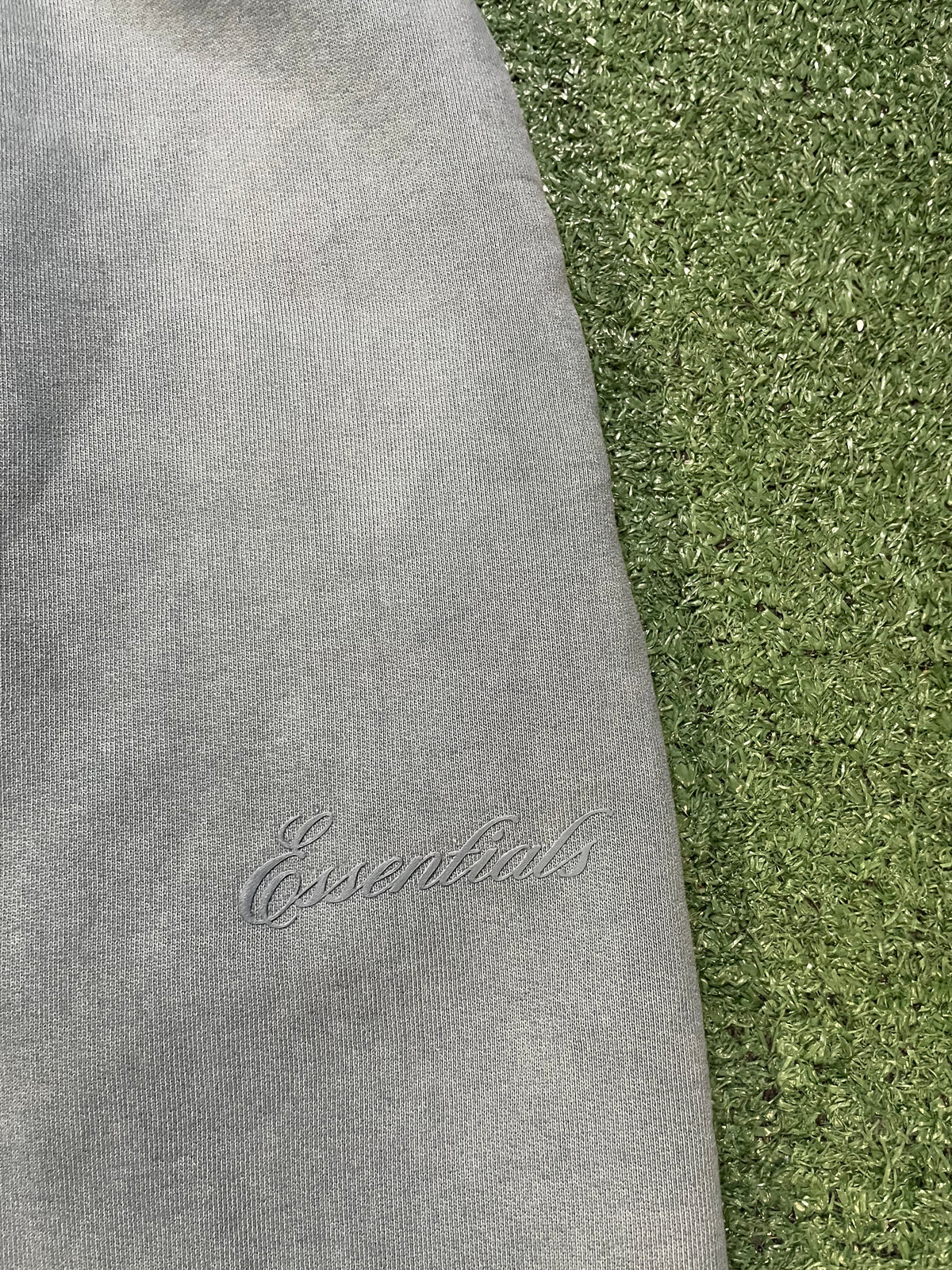 Fear of god essentials 
Faded coastal Signature Flare Sweatpants
