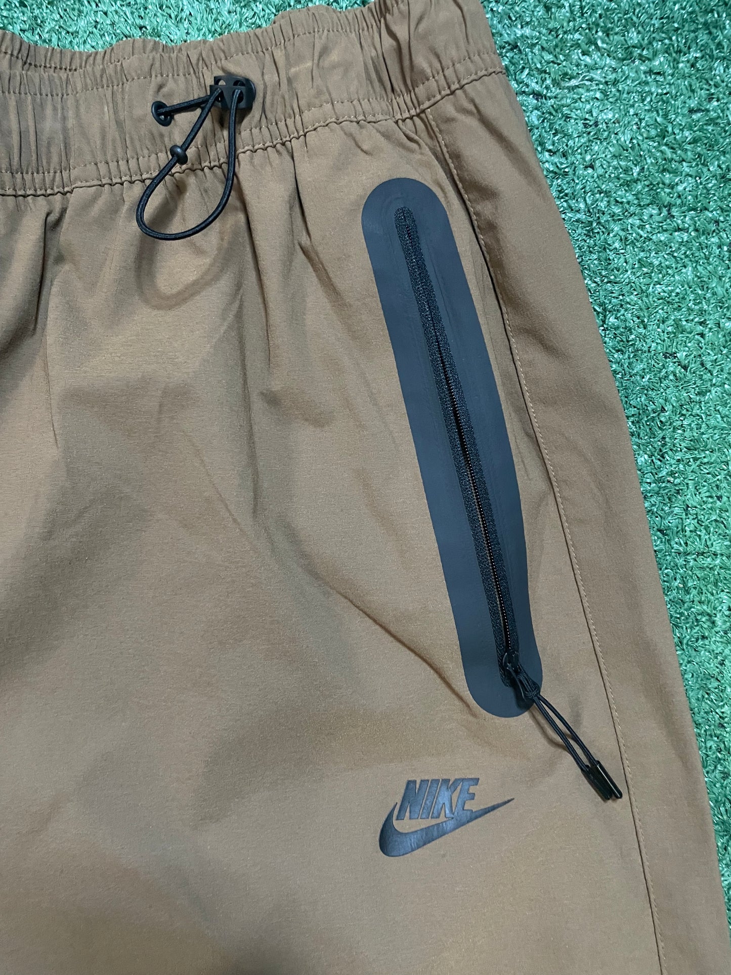 Nike tech woven khaki pants