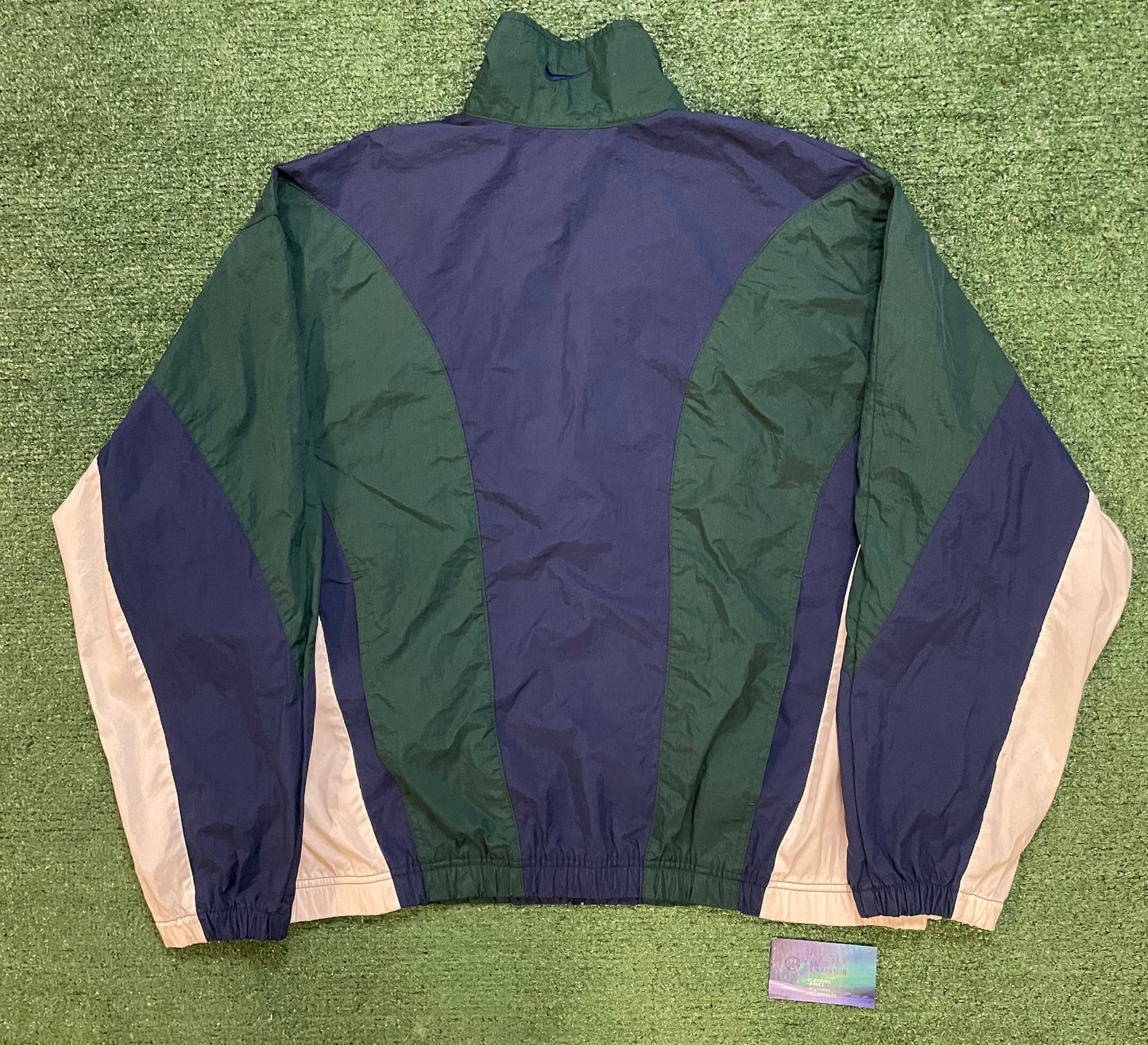 Vintage 1990s Nike blue green and white windbreaker jacket