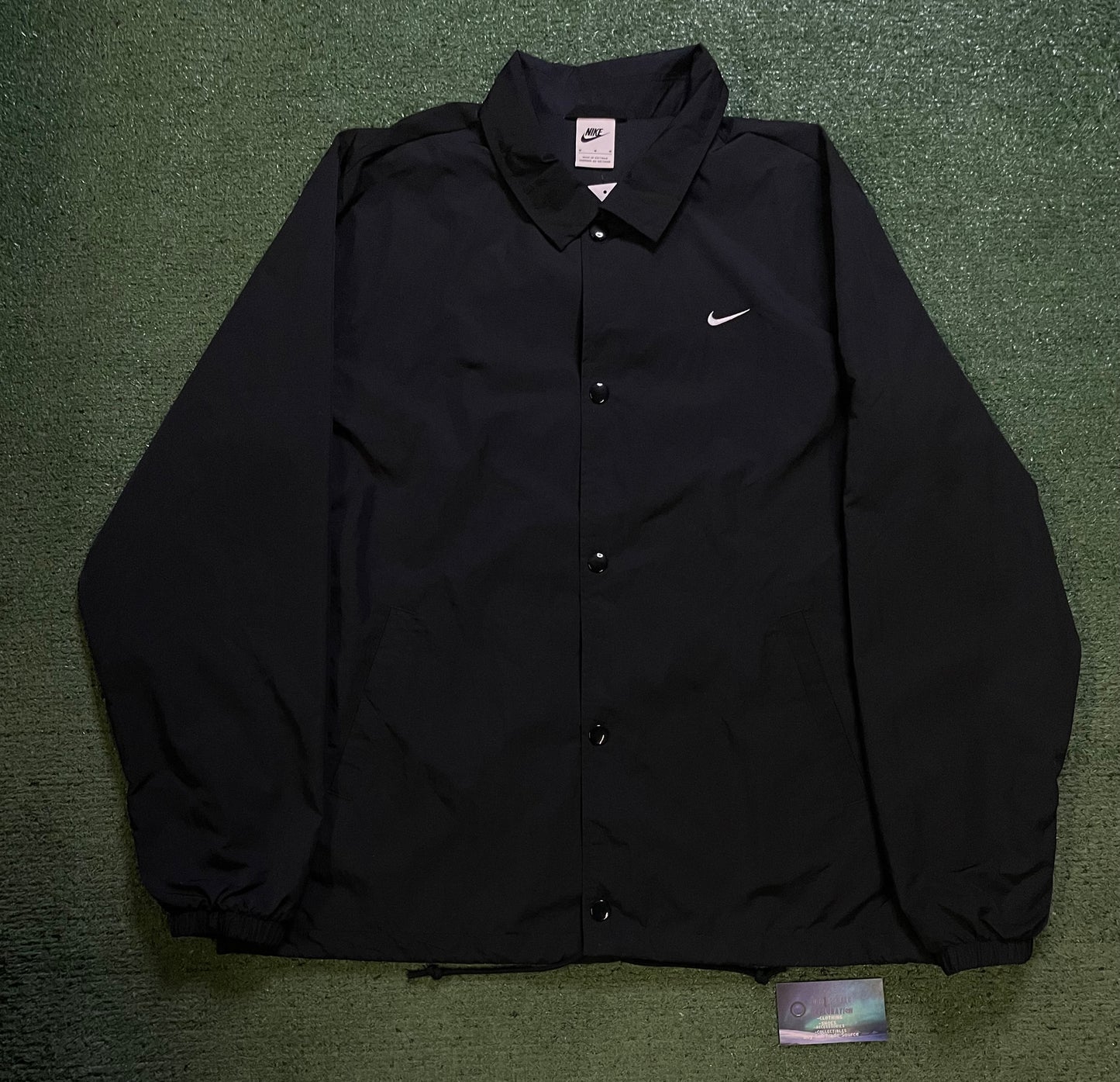 Nike black coach jacket