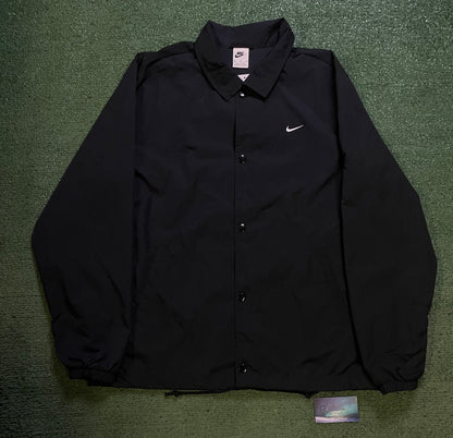 Nike black coach jacket